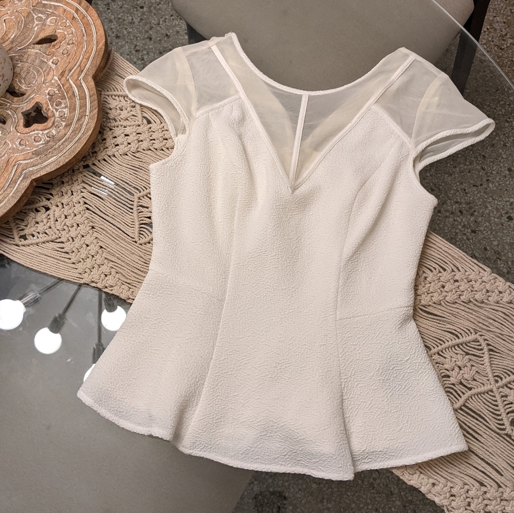 White peplum top